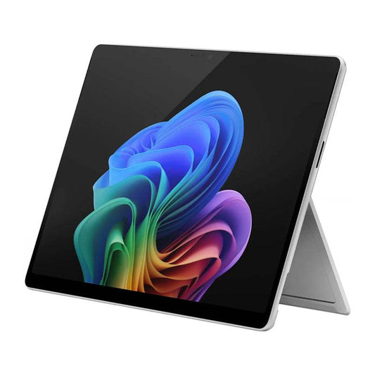 The new Microsoft Surface Pro with an OLED screen showing a vibrant wallpaper.